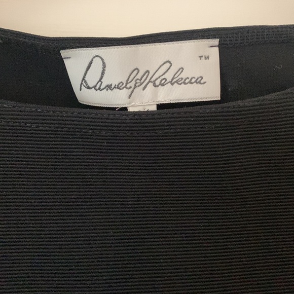 Ribbed black dress top with cut outs on both shoulders - Picture 2 of 3